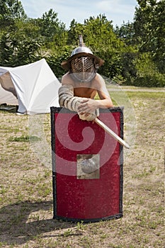 Boy in combat gladiator armor