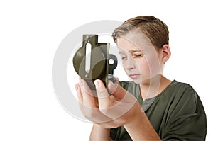 Boy with compass on white background photo