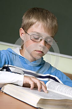 Boy concentrated with reading