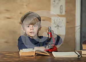 The boy conducts experiments in biology