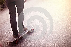 Boy cruising on a longboard