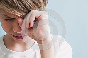 Boy is crying. Emotion concept