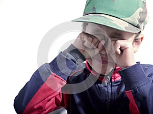 Boy crying in poverty stock photo