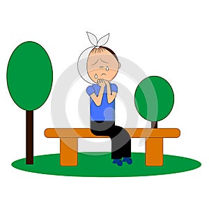 A boy crying from a toothache on a bench.