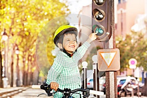 Boy cycling on his bike and learning traffic rules