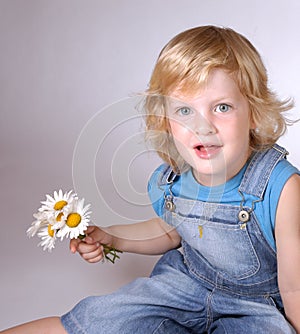 Boy with daisies