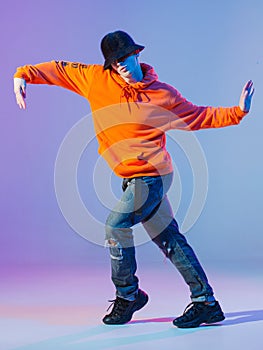Boy dancing contemporary dance in studio. Breakdancing.