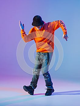 Boy dancing contemporary dance in studio. Breakdancing.