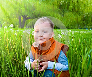 The boy with a dandelion