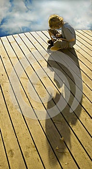 Boy on deck playing a game