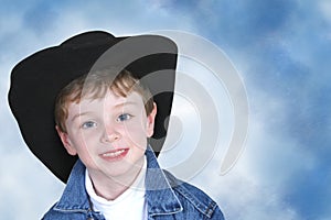 Boy in Denim Jacket and Black Cowboy Hat