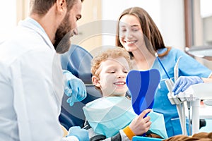 Boy with dentist at the dental office