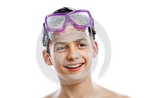 Boy diver in swimming mask with a happy face close-up portrait, isolated on white