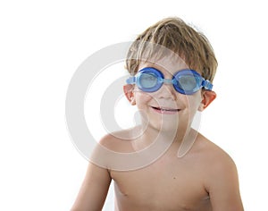 Boy in diving goggles over white