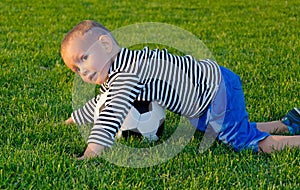 Boy diving on a soccer ball