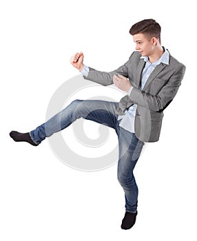 Boy does karate kick