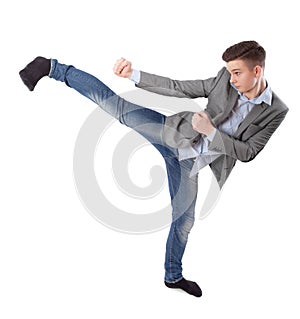 Boy does karate kick