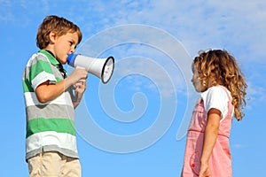 Boy does reprimand to girl through loudspeaker photo