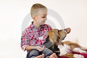 Boy with a dog beagle