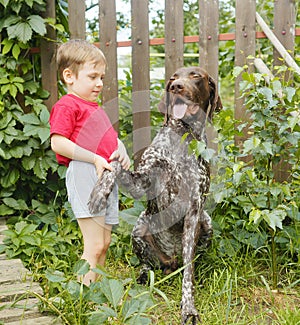 Boy with a dog. Best friends. Pets and children. Funny moments. Happy childhood.