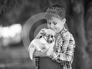 boy with a dog black and white photo.