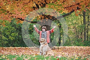 Boy and Dog in the Fall