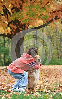 Boy and Dog in the Fall
