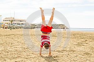 Boy doing a handstand