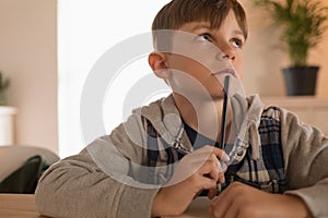 Boy doing his homework at home