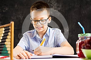Boy doing math homework at home