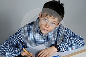 Boy doing maths homework