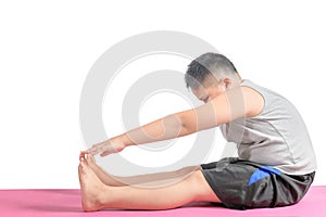 Boy doing workout to lose weight on yoga mat isolated