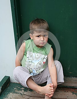 Boy on doorstep