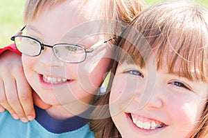 Boy With Downs-Syndrome with Sister photo
