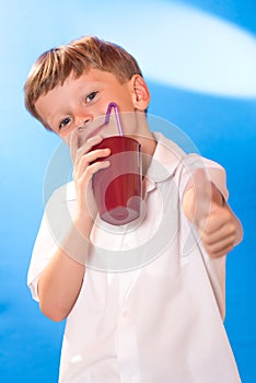The boy drank a beverage a tubule