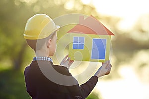 Boy dreams of a house