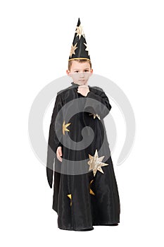 Boy dressed as astrologer. Isolated