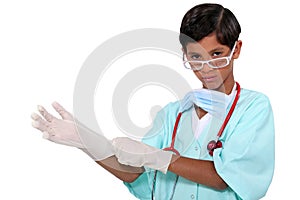 Boy dressed as surgeon