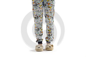 Boy dressed in pyjama isolated on white