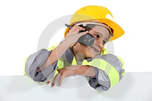 Boy dressed in worker costume