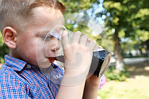 Boy drinking kvass