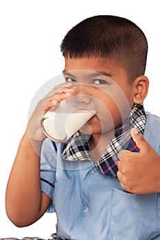 Boy drinking milk and concede