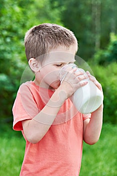 Boy drinks fresh milk