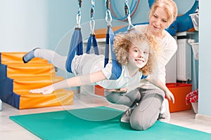 Boy on dual swing