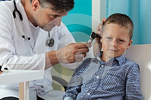 Boy during ear examination