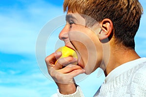 Boy eat apple