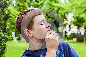 Boy eating a bread