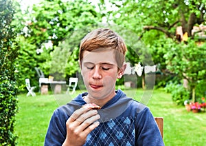 Boy eating a bread