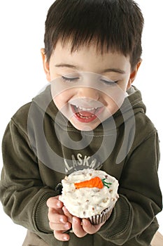 Boy Eating Carrot Cupcake