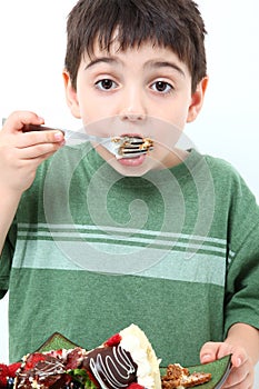 Boy Eating Cheesecake